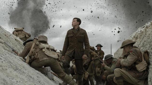 This image released by Universal Pictures shows George MacKay, center, in a scene from 1917.(AP)