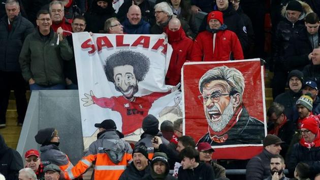 Liverpool fans displays banners of Mohamed Salah and manager Jurgen Klopp.(Action Images via Reuters)