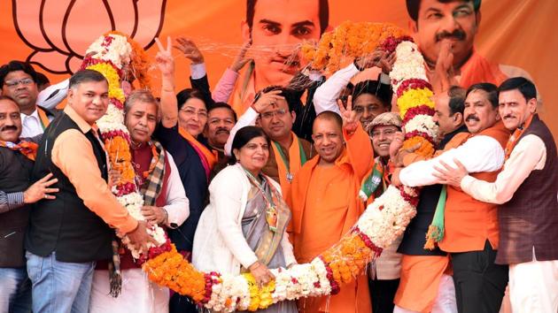 BJP workers felicitate Chief Minister Uttar Pradesh Yogi Adityanath during a public meeting at Talaab Park, Mandawali. Yogi Adityanath was a key campaigner for the BJP, focusing largely on how a win for the AAP would benefit Pakistan. According to the BJP, senior party leaders held 5,239 rallies, public meetings, ‘nukkad sabhas’, party workers’ meetings and road shows as part of its campaign. (Sonu Mehta / HT Photo)