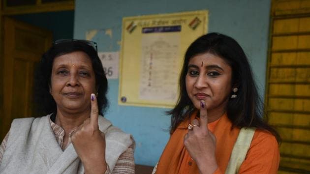 Women show their inked fingers after casting their vote in Delhi Assembly elections at Krisha Nagar in East Delhi. (Sonu Mehta/HT Photo) Women show their inked fingers after casting their vote in Delhi Assembly elections at Krisha Nagar in East Delhi. (Sonu Mehta/HT Photo)