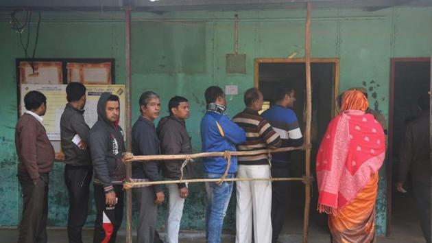Voters stand in a queue at a polling booth in Madanpur Khadar in Delhi. (Amal KS/HT Photo) Voters stand in a queue at a polling booth in Madanpur Khadar in Delhi. (Amal KS/HT Photo)
