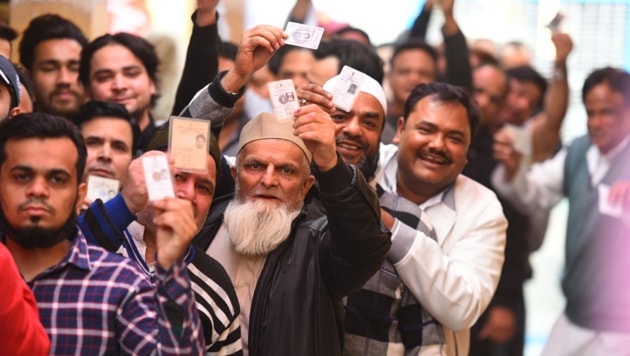 People stand in the queue to cast their vote for Delhi Assembly election 2020 at Old Delhi Area in New Delhi, India, on Saturday, February 8, 2020.(Photo: Raj K Raj/ Hindustan Times) People stand in the queue to cast their vote for Delhi Assembly election 2020 at Old Delhi Area in New Delhi, India, on Saturday, February 8, 2020.(Photo: Raj K Raj/ Hindustan Times)