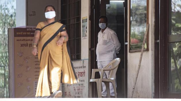 Staff members of the Naidu Hopspital are seen wearing masks to handle the Coronavirus threat on Friday. (Pratham Gokhale/HT Photo) Staff members of the Naidu Hopspital are seen wearing masks to handle the Coronavirus threat on Friday. (Pratham Gokhale/HT Photo)