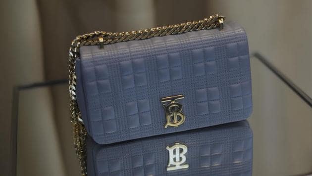 A luxury leather Burberry TB handbag sits in a window display at a Burberry Group Plc luxury fashion store in London, U.K., on Friday, Feb. 7, 2020. Burberry scrapped its financial guidance for the year, warning that the coronavirus epidemic is cutting sales by three-quarters or more at stores in China. Photographer: Simon Dawson/Bloomberg(Bloomberg)