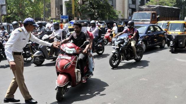 A hefty combined fine was slapped on a Odisha man for letting his minor son drive his scooter and for other violations. (HT Photo/File/Representative) A hefty combined fine was slapped on a Odisha man for letting his minor son drive his scooter and for other violations. (HT Photo/File/Representative)