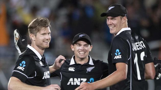 Auckland: Black Caps, from left, James Neesham, Tom Latham and Kyle Jamieson celebrate their win over India. (AP)