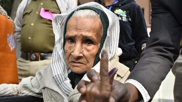Kalitara Mandal, the oldest voter of Delhi at 111, cast her ballot in Greater Kailash assembly constituency. She is among the more than 130 centenarian voters eligible to exercise their franchise on Saturday. “I will vote till I am alive. I had first voted before the Partition while I still lived in Barishal,” said Mandal. (Sanjeev Verma / HT Photo)