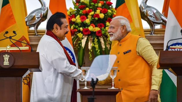 Prime Minister Narendra Modi with Sri Lankan Prime Minister Mahinda Rajapaksa at Hyderabad House, in New Delhi on Saturday. (PTI) Prime Minister Narendra Modi with Sri Lankan Prime Minister Mahinda Rajapaksa at Hyderabad House, in New Delhi on Saturday. (PTI)