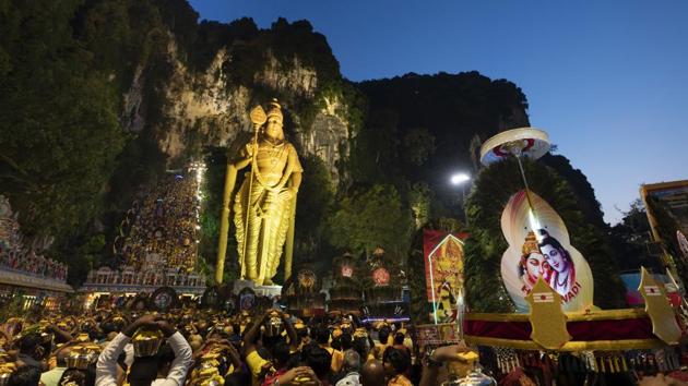Giant Kavadi offering cages are carried by Hindu devotees in a procession during the Thaipusam festival at Batu Caves, outskirts of Kuala Lumpur, Saturday, Feb. 8, 2020. (AP) Giant Kavadi offering cages are carried by Hindu devotees in a procession during the Thaipusam festival at Batu Caves, outskirts of Kuala Lumpur, Saturday, Feb. 8, 2020. (AP)