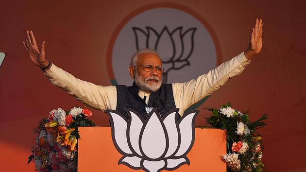 Prime Minister Narender Modi gestures during an campaign rally for the Delhi Assembly election at CBD Ground in Karkardooma, New Delhi. (Raj K Raj / HT Photo)