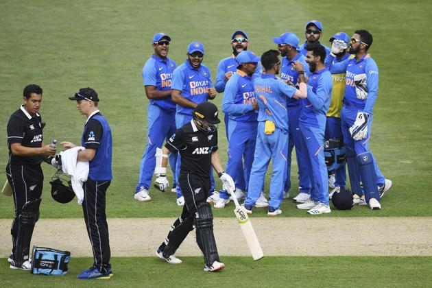India's Ravindra Jadeja celebrates with teammates after trapping Tom Latham, third from left, LBW during a One Day International cricket between India and New Zealand at Eden Park in Auckland. (AP)