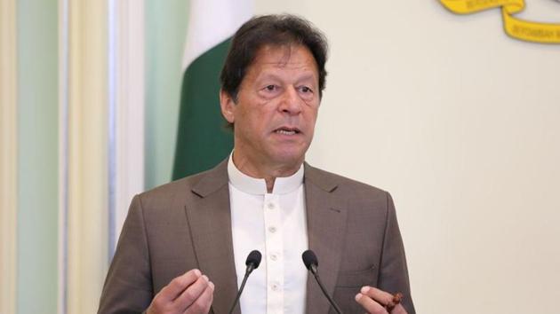 Pakistan's Prime Minister Imran Khan’s Tehreek-e-Insaf party has suspended the general secretary of its Lahore chapter over a poster that had featured an insulting remark targeting Hindus. (REUTERS) Pakistan's Prime Minister Imran Khan’s Tehreek-e-Insaf party has suspended the general secretary of its Lahore chapter over a poster that had featured an insulting remark targeting Hindus. (REUTERS)