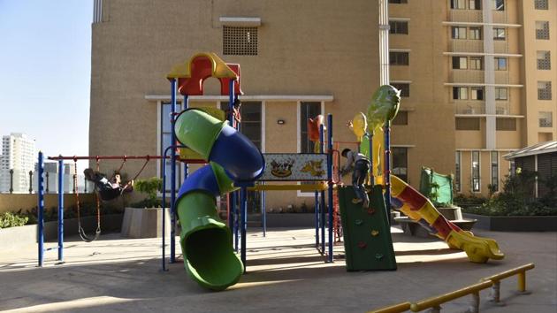 Apart from the houses, the residents have been provided with various amenities such as gymnasium, community hall, library, walking tracks and toddler parks in these towers. (Anshuman Poyrekar/HT Photo)