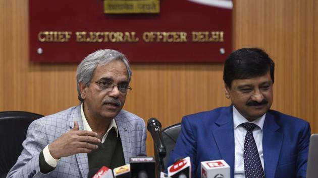 Chief Electoral Officer Dr Ranbir Singh (L) and other Election Commission of India (ECI) officials address a press conference to announce the overall percentage of voting during Delhi Legislative Assembly elections, at Chief Electoral Office, in New Delhi. (Burhaan Kinu/HT PHOTO)