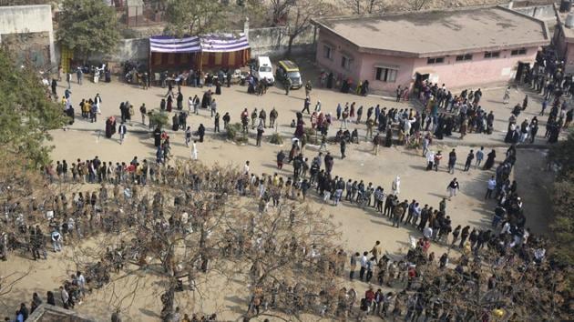 Voters stand in a queue to cast their vote for Delhi assembly election, at Shaheen Bagh, in New Delhi on Saturday, February 8, 2020. (Burhaan Kinu/HT PHOTO) Voters stand in a queue to cast their vote for Delhi assembly election, at Shaheen Bagh, in New Delhi on Saturday, February 8, 2020. (Burhaan Kinu/HT PHOTO)