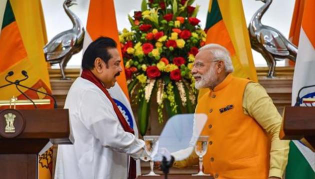 Prime Minister Narendra Modi (R) shakes hands with Sri Lankan Prime Minister Mahinda Rajapaksa after a joint statement at Hyderabad House, in New Delhi, Saturday, Feb. 8, 2020.(PTI)