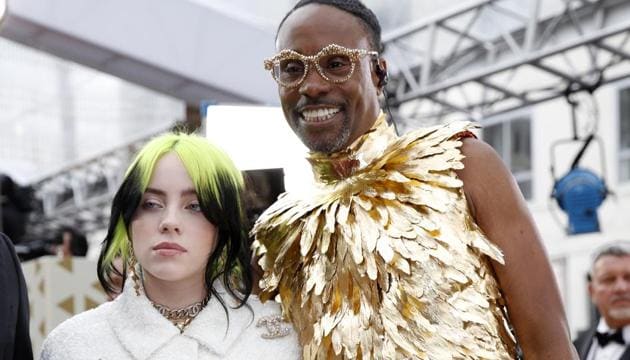 Billie Eilish and Billy Porter pose on the red carpet during the Oscars arrivals at the 92nd Academy Awards in Hollywood.(REUTERS)