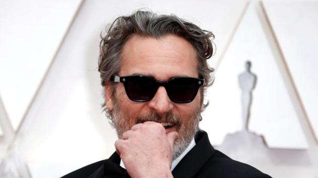 Joaquin Phoenix poses on the red carpet during the Oscars arrivals at the 92nd Academy Awards in Hollywood, Los Angeles, California.(REUTERS)