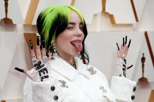 Billie Eilish, wearing Channel, poses on the red carpet during the Oscars arrivals at the 92nd Academy Awards in Hollywood, Los Angeles, California, U.S., February 9, 2020. REUTERS/Eric Gaillard (REUTERS)