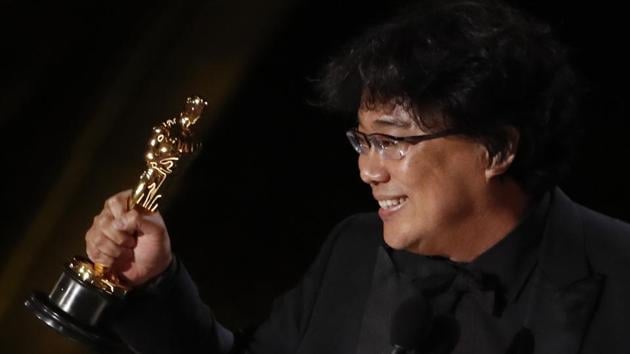 Bong Joon Ho receives the Oscar for Best Original Screenplay for Parasite.(REUTERS)