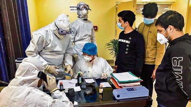 Indian nationals who were airlifted from coronavirus-hit China’s Hubei are undergoing tests at a quarantine facility in New Delhi on Feb 3. (PTI photo) Indian nationals who were airlifted from coronavirus-hit China’s Hubei are undergoing tests at a quarantine facility in New Delhi on Feb 3. (PTI photo)