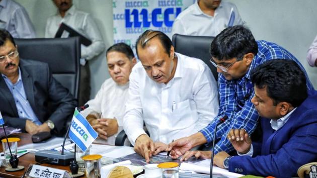 Ajit Pawar (centre) during the meeting with industry representatives at Mahratta Chamber of Commerce Industries and Agriculture (MCCIA) headquarters, Senapati Bapat road on Saturday. (HT/PHOTO) Ajit Pawar (centre) during the meeting with industry representatives at Mahratta Chamber of Commerce Industries and Agriculture (MCCIA) headquarters, Senapati Bapat road on Saturday. (HT/PHOTO)