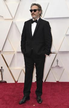 Joaquin Phoenix arrives at the Oscars on Sunday, Feb. 9, 2020, at the Dolby Theatre in Los Angeles. (Photo by Richard Shotwell/Invision/AP) (Richard Shotwell/Invision/AP)