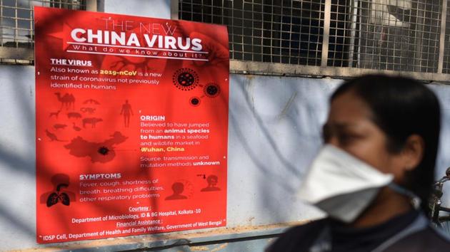 A poster with information on coronavirus placed at Beleghata ID and BG Hospital, Kolkata. Of the 3,114 people under watch, 3,099 are under home quarantine and 45 in hospitals as they had minor symptoms of the virus, Kerala health minister K K Shailaja said a day after lifting the state calamity status. The state has not lowered its guard, she said. (Samir Jana / HT Photo)