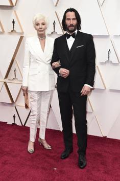 Patricia Taylor, left, and Keanu Reeves arrive at the Oscars on Sunday, Feb. 9, 2020, at the Dolby Theatre in Los Angeles. (Photo by Jordan Strauss/Invision/AP) (Jordan Strauss/Invision/AP)