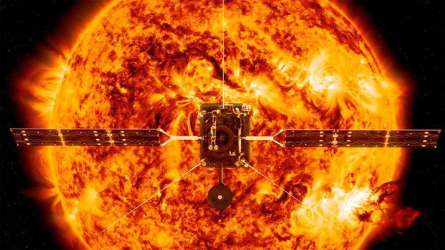 An illustration depicts the Solar Orbiter in front of the Sun. Ten instruments on board will record myriad observations to help scientists unlock clues about what drives solar winds and flares. To protect the instruments, engineers devised a heat shield with an outer coating made of burned bone charcoal similar to what was used in prehistoric cave paintings. It can withstand temperatures up to nearly 530 degrees Celsius. (ESA/ATG medialab, NASA/SDO/P. Testa (CfA) viaAP)