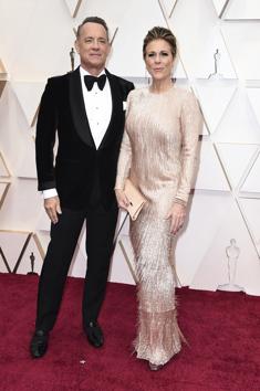 Tom Hanks, left, and Rita Wilson arrive at the Oscars on Sunday, Feb. 9, 2020, at the Dolby Theatre in Los Angeles. (Photo by Jordan Strauss/Invision/AP) (Jordan Strauss/Invision/AP)