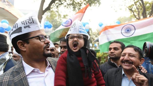 AAP supporters jubilant after AAP candidates lead across constituencies. (A Yadav/HT Photos) AAP supporters jubilant after AAP candidates lead across constituencies. (A Yadav/HT Photos)