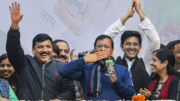 New Delhi: Delhi CM and AAP convenor Arvind Kejriwal (C) gestures during his address to supporters after party's victory in the State Assembly polls, at AAP office in New Delhi, Tuesday, Feb. 11, 2020. Kejriwal's wife Sunita, and party leaders Sanjay Singh are also seen. (PTI Photo)(PTI2_11_2020_000241B) (PTI) New Delhi: Delhi CM and AAP convenor Arvind Kejriwal (C) gestures during his address to supporters after party's victory in the State Assembly polls, at AAP office in New Delhi, Tuesday, Feb. 11, 2020. Kejriwal's wife Sunita, and party leaders Sanjay Singh are also seen. (PTI Photo)(PTI2_11_2020_000241B) (PTI)