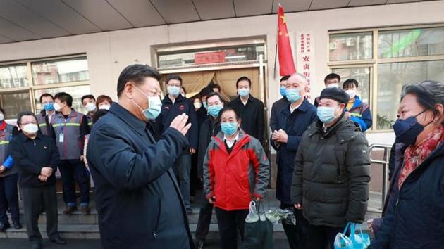 Chinese President Xi Jinping inspects the novel coronavirus prevention and control work at Anhuali Community in Beijing, China.(REUTERS)