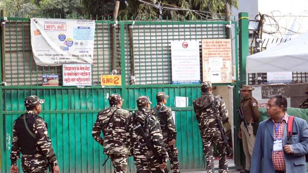 Security personnel are seen outside counting centres ahead of the Delhi assembly election result, at Gole Market. Security personnel are seen outside counting centres ahead of the Delhi assembly election result, at Gole Market.