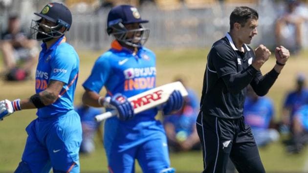 New Zealand's Hamish Bennet, right, celebrates the wicket of India's Virat Kohli .(AP)