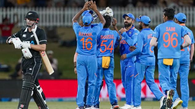 India celebrate the wicket of New Zealand's Henry Nicholls, left, during the One Day cricket international between India and New Zealand at Bay Oval, Tauranga, New Zealand, Tuesday 11 Feb 2020. (John Cowpland/Photosport via AP)(AP)