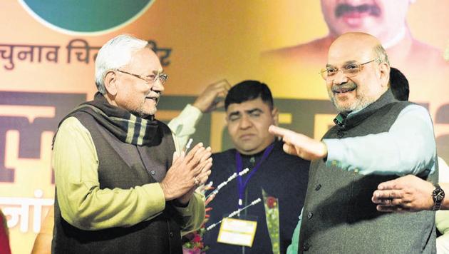 Bihar Chief Minister and Janata Dal (United) president Nitish Kumar with Union Home Minister Amit Shah at an election rally in New Delhi.(HT PHOTO) Bihar Chief Minister and Janata Dal (United) president Nitish Kumar with Union Home Minister Amit Shah at an election rally in New Delhi.(HT PHOTO)