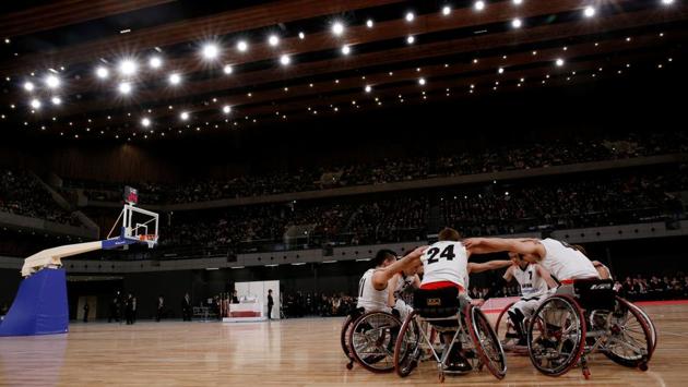 Members of Japan's national wheelchair basketball team participate in a group cheer. The lawmakers entered parliament at a time when Japan is working to better accommodate people with disabilities ahead of the 2020 Paralympic Games. Japan’s government says there are 9.63 million people with physical, mental or intellectual disabilities in the country, accounting for more than 7% of the total population. (Kim Kyung-Hoon / REUTERS)