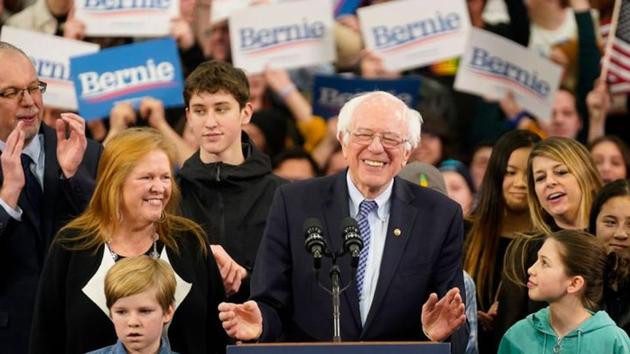 Democratic U.S. presidential candidate Senator Bernie Sanders is accompanied by his wife Jane O’Meara Sanders and other relatives as he speaks at his New Hampshire primary night rally in Manchester, N.H., U.S., February 11, 2020.(REUTERS)