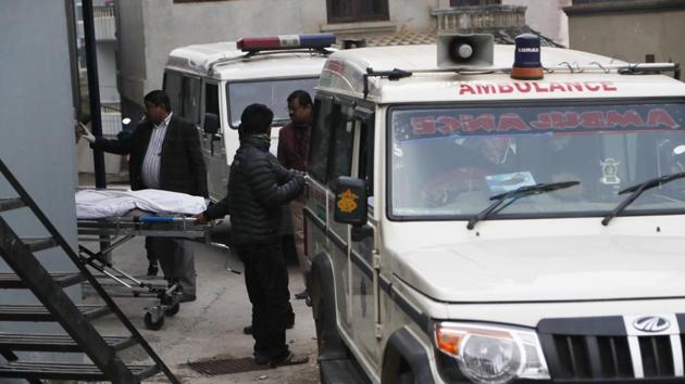 Hospital staff load bodies of Indian tourists into an ambulance for postmortem, at a hospital in Kathmandu, Nepal on Jan. 21, 2020. Eight Indian tourists were declared dead after being found unconscious in their room at a mountain resort in Nepal, police said. (AP FILE) Hospital staff load bodies of Indian tourists into an ambulance for postmortem, at a hospital in Kathmandu, Nepal on Jan. 21, 2020. Eight Indian tourists were declared dead after being found unconscious in their room at a mountain resort in Nepal, police said. (AP FILE)