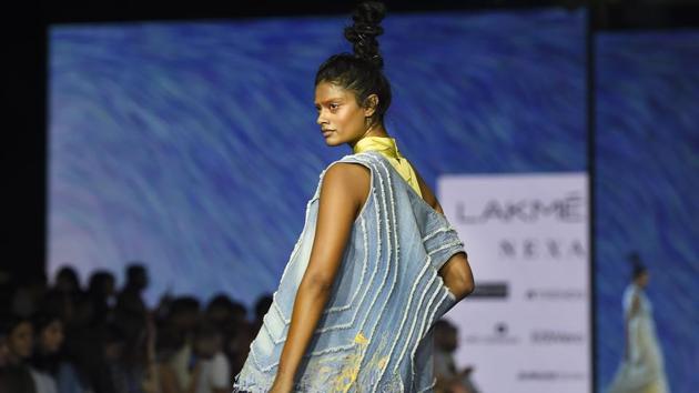 A model walks on a ramp for designer Abhishek during Lakme Fashion Week Summer/Resort 2020 in Mumbai. (PTI) A model walks on a ramp for designer Abhishek during Lakme Fashion Week Summer/Resort 2020 in Mumbai. (PTI)
