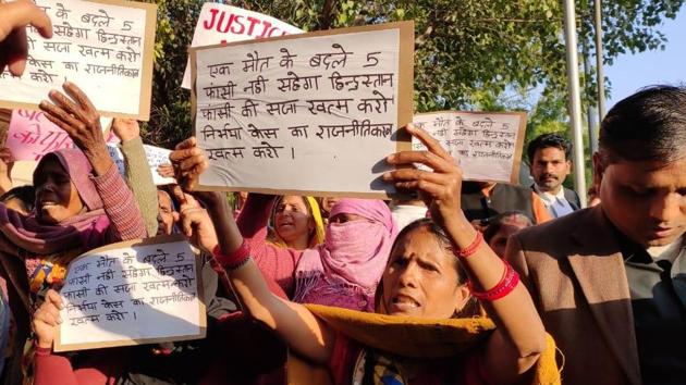 The mother of one of the Delhi ganrape convicts Vinay Sharma outside a Delhi court on Thursday.(HT Photo)