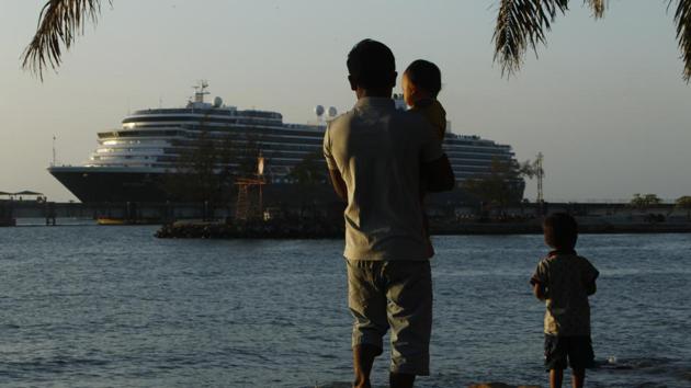 The Westerdam cruise ship, owned by Holland America Line, is docked at the port of Sihanoukville. Westerdam, turned away by 4 Asian and Pacific govts. due to virus fears, anchored Thursday off Cambodia for health checks on its 2,200 passengers and crew. (AP) The Westerdam cruise ship, owned by Holland America Line, is docked at the port of Sihanoukville. Westerdam, turned away by 4 Asian and Pacific govts. due to virus fears, anchored Thursday off Cambodia for health checks on its 2,200 passengers and crew. (AP)
