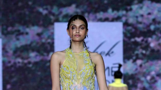 A model walks the ramp showcasing the creation of fashion designer Swapnil Shinde on Day 2. (IANS)