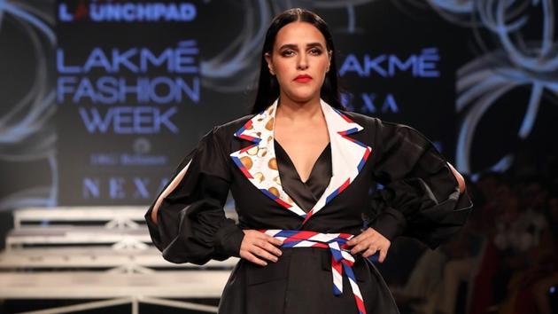 Actor Neha Dhupia showcases the creation of Ajio on Day 2 of the Lakme Fashion Week Summer/Resort 2020. (IANS)