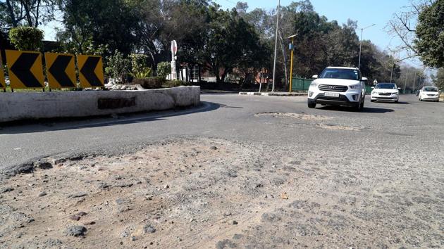The road between Panjab University and Post Graduate Institute of Medical Education and Research, which falls in the mayor’s ward, is full of craters.(Sanjeev Sharma/HT) The road between Panjab University and Post Graduate Institute of Medical Education and Research, which falls in the mayor’s ward, is full of craters.(Sanjeev Sharma/HT)