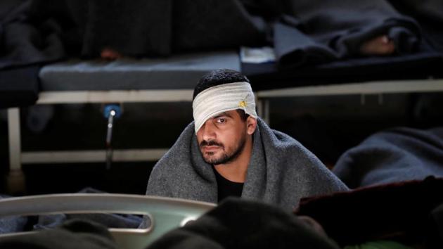 A foreign prisoner with a bandage wrapped around his head, inside a prison hospital in Hasaka. Kurdish forces bear the brunt of looking after those captured as Islamic State collapsed, including hundreds of foreigners who fought alongside local militants to create a self-declared caliphate in the Middle East. (Goran Tomasevic / REUTERS)