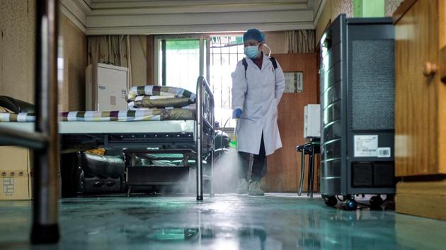 A doctor disinfects a room for medical staff with sanitizing equipment at a community health service center in China’s Hubei. Japan has confirmed that an 80-year-old woman died due to contracting coronavirus disease. (REUTERS/Representative Picture) A doctor disinfects a room for medical staff with sanitizing equipment at a community health service center in China’s Hubei. Japan has confirmed that an 80-year-old woman died due to contracting coronavirus disease. (REUTERS/Representative Picture)