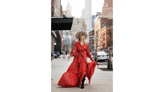 Argentine designer Mery Garavilla poses for photographers in one of her designs after attending a show. From the 6-year-old Instagram influencer to a legend in the industry, Vogue’s former editor-at-large Andre Leon Talley, there was much to behold and capture. (Mark Lennihan / AP)